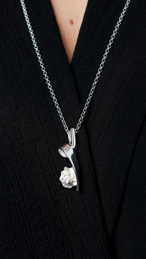 Valve. silver pendant